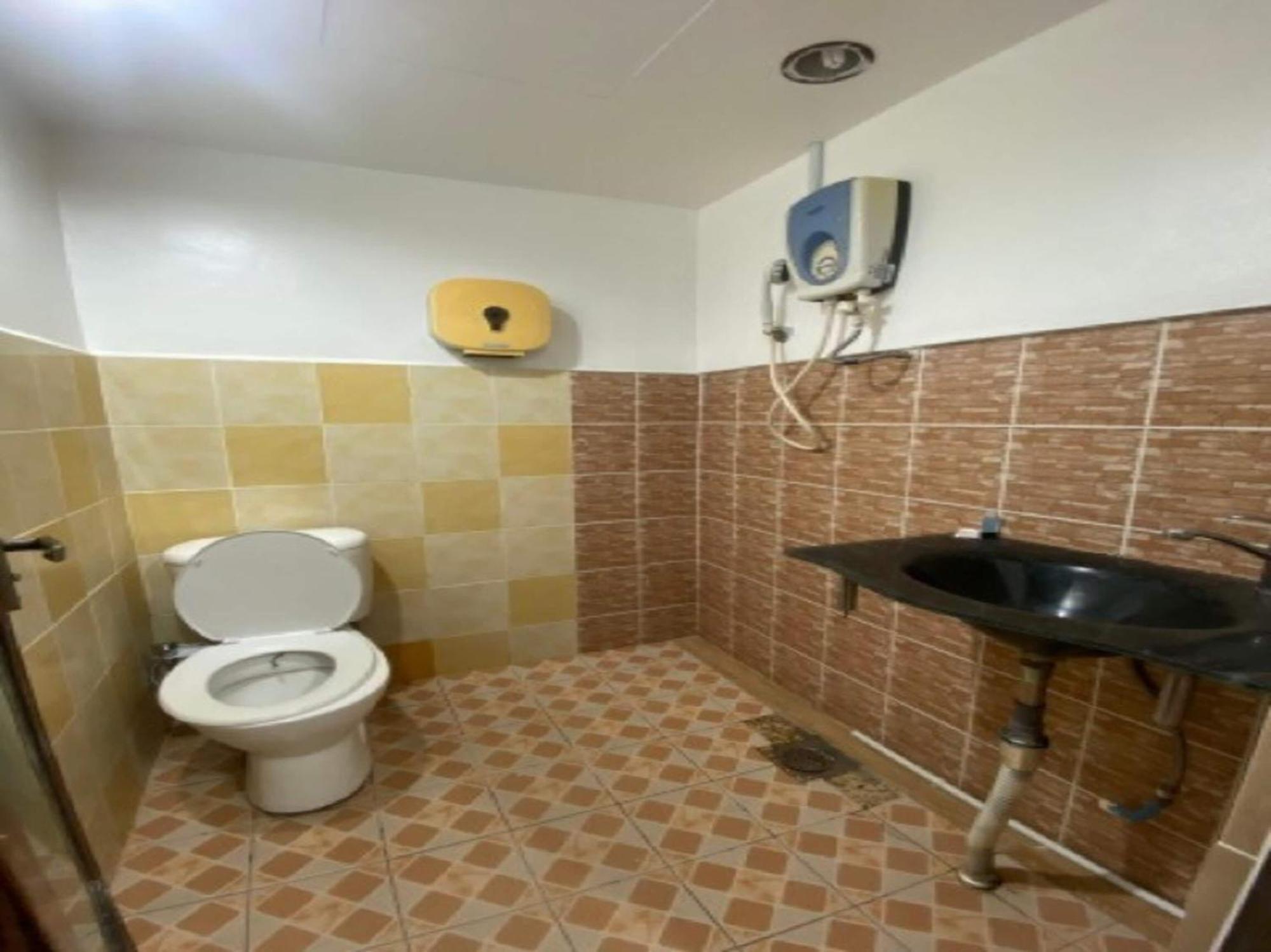 Oyo 90979 Sianglory Inn Kota Kinabalu Eksteriør bilde